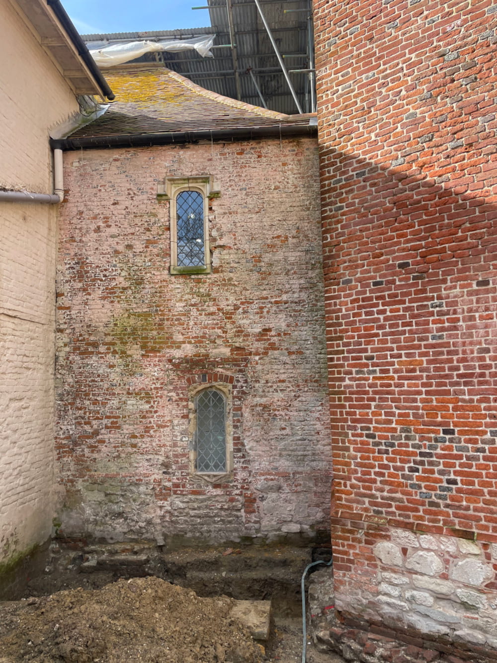 An external view of 3 different types of brickwork which make up the historic exterior of the 15th Century Manor interior design project.