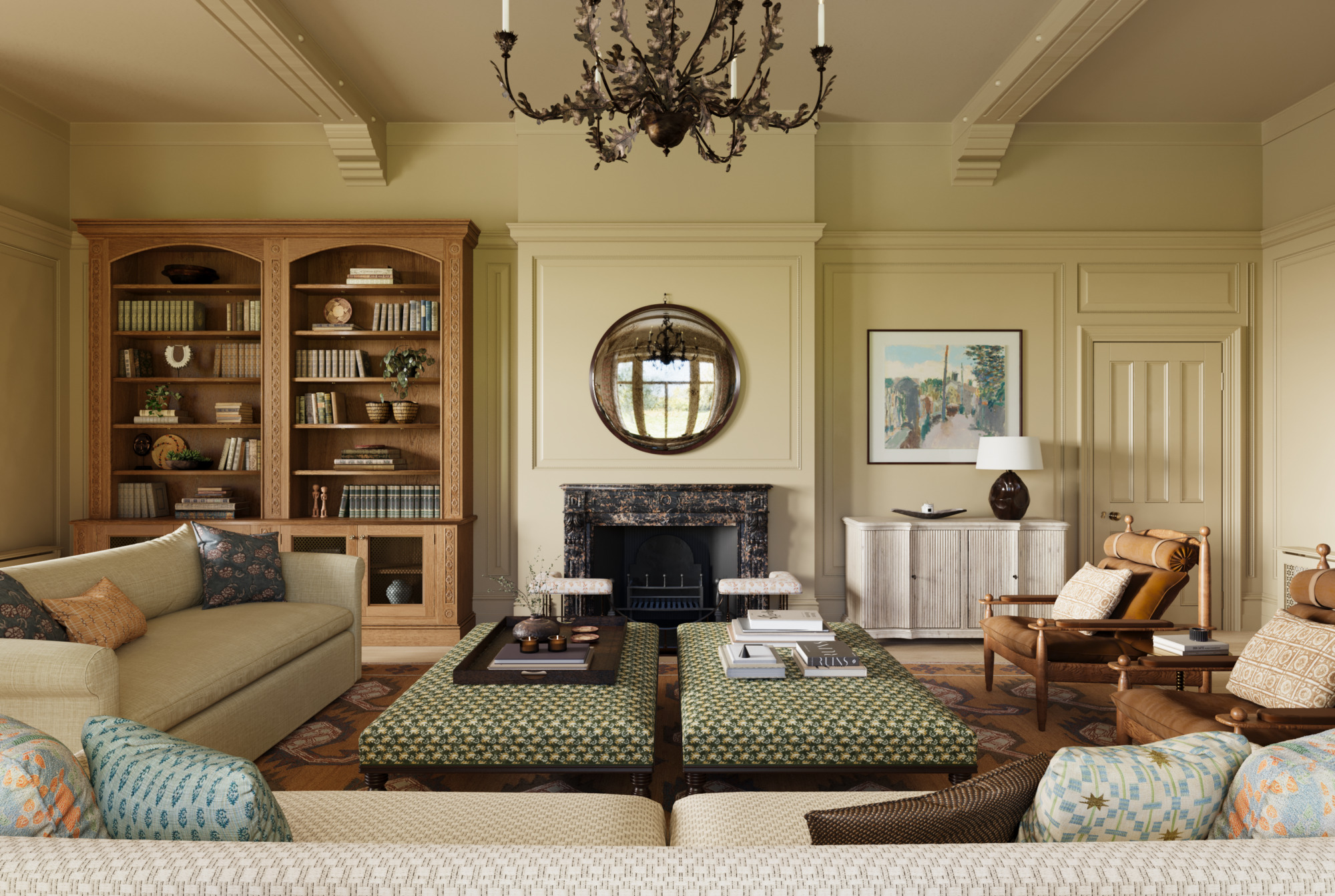A view of the dark stone fireplace of the Queen Anne Interior Design Project in the drawing room showing a large panelled room with large beige sofas, circular mirror and black floral metal chandelier.
