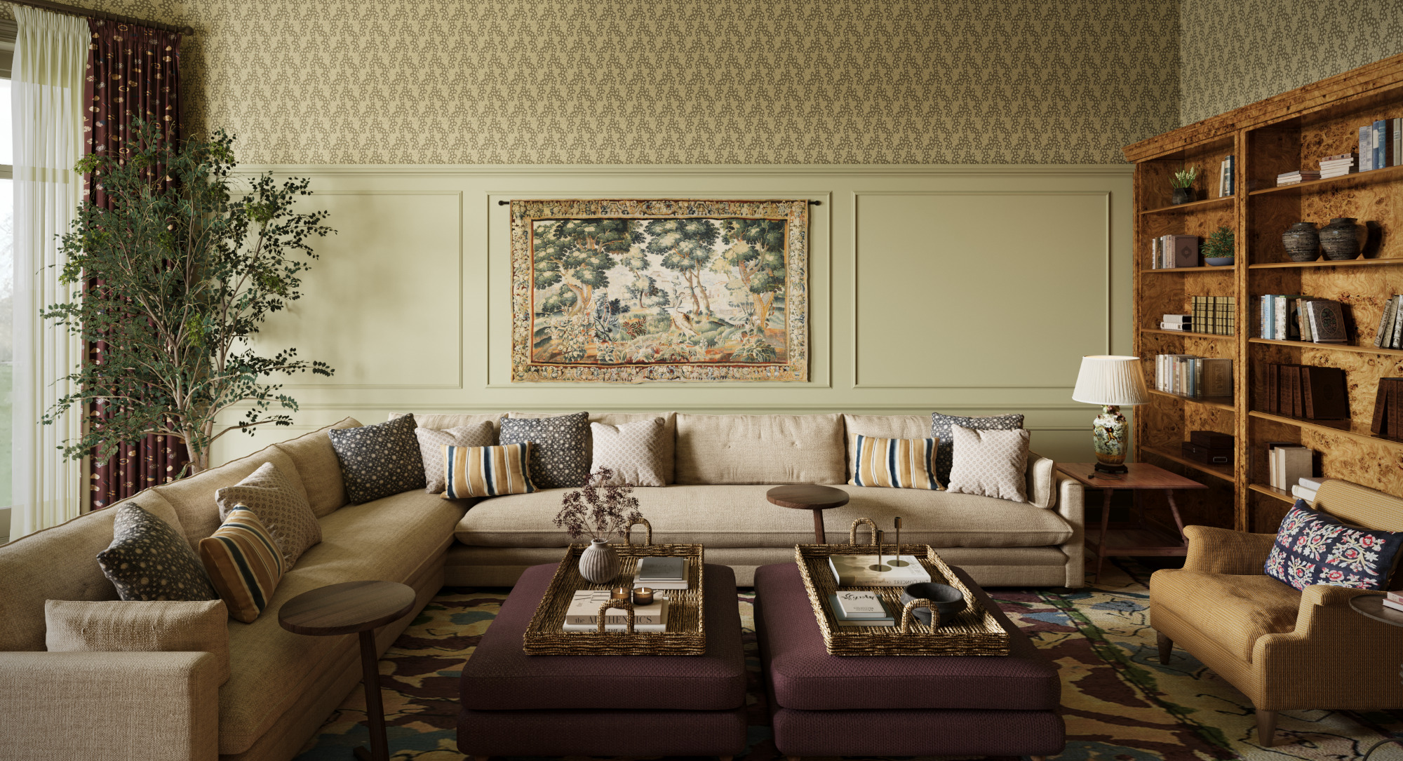 A wide view of the principle living room showing an ornate panelled and wallpapered room, large built in shelsves with books and ornaments. A large wrap around beige sofa with colourful cushions fills the room besides which sit two large plum coloured pouffes with trays of objects as part of the Queen Anne Interior Design Project.