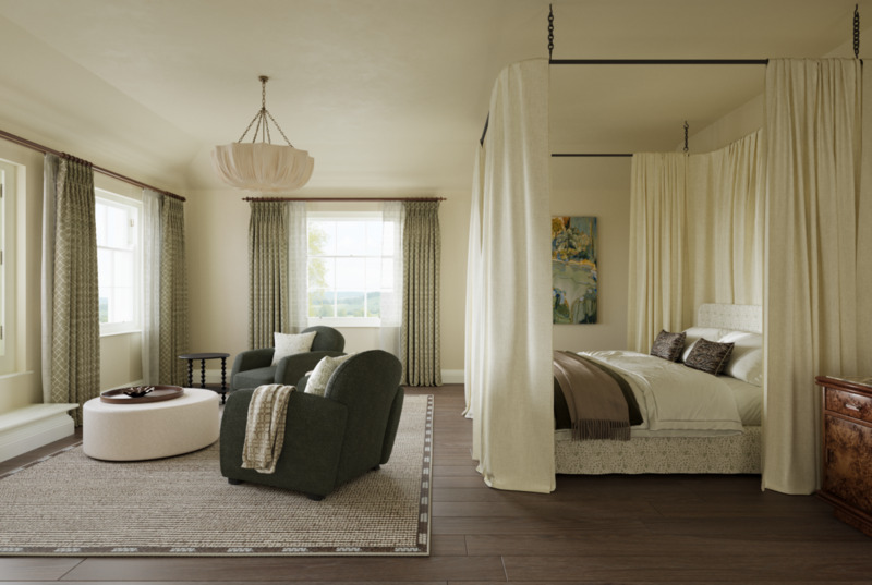 The master bedroom of the Sussex estate house shows a large modern white room with dark hardwood floor with a king size bed surrounded by white curtains. Towards the window two large danish inspired armchairs in a dark green fabric look out towards the surrounding countryside.